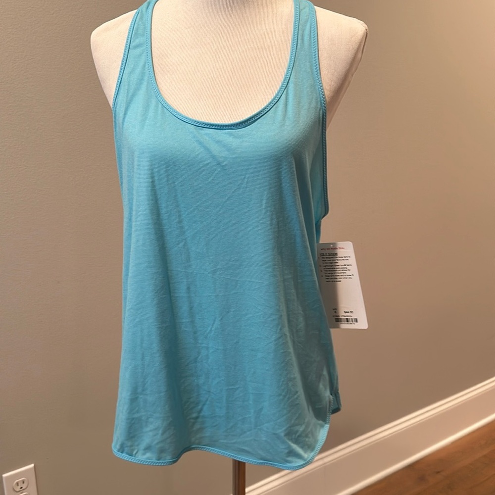 NWT 105F singlet in blue size 8